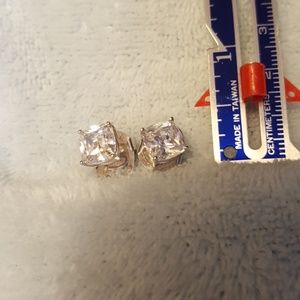 Large crystal earrings.